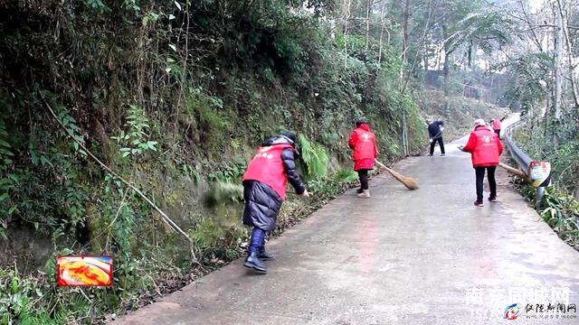 “志愿红”点亮新春 擦亮文明乡村“底色”-3.jpg